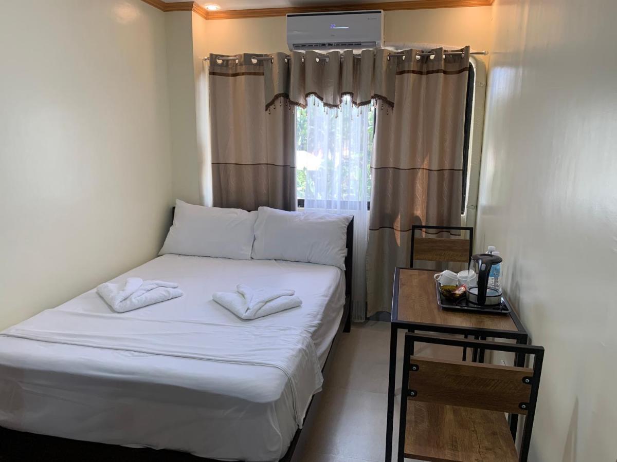 Zl Travelers Inn Batuan ภายนอก รูปภาพ