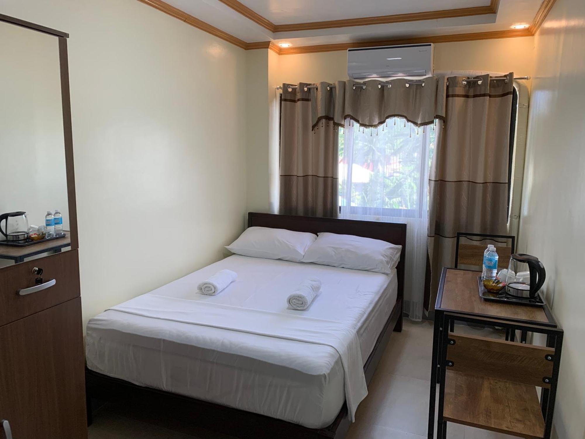 Zl Travelers Inn Batuan ภายนอก รูปภาพ