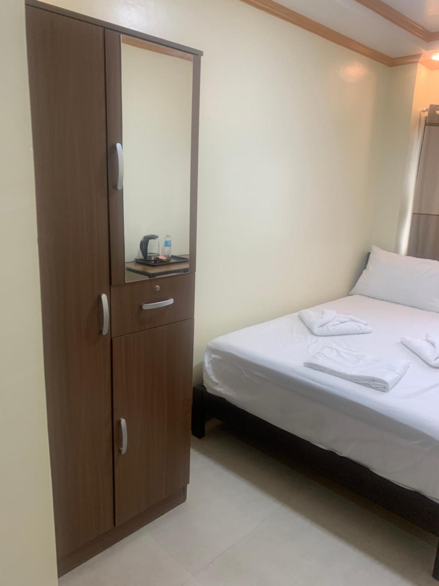 Zl Travelers Inn Batuan ภายนอก รูปภาพ