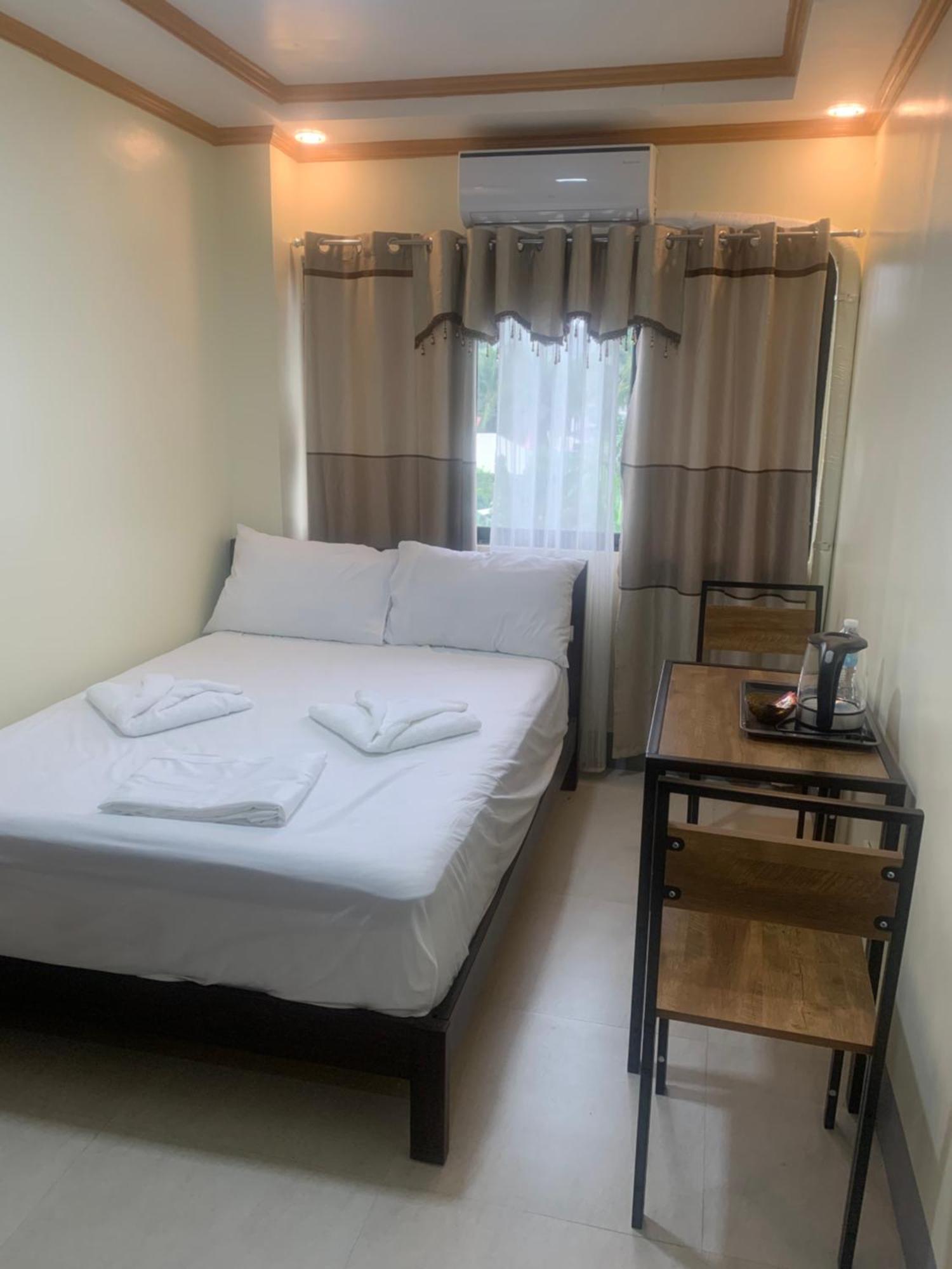 Zl Travelers Inn Batuan ภายนอก รูปภาพ